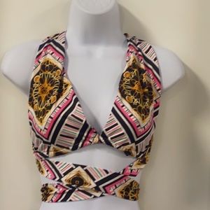 This is a two piece wrap around top with adjustable one size maxi skirt